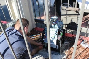 Cody installing new gate operator 